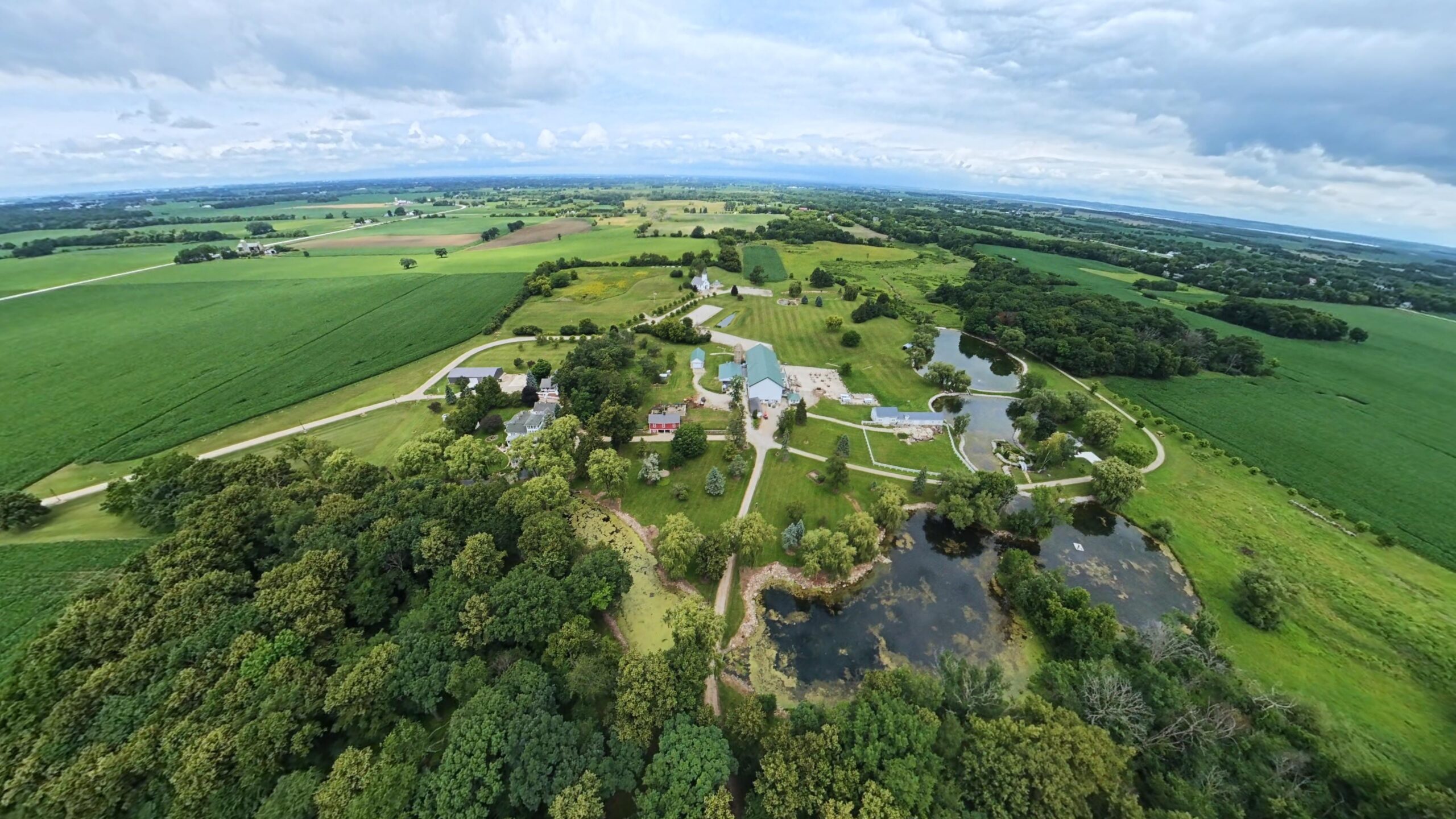 Drone perspective highlighting buildings and surrounding grounds